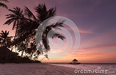 Sunset on the beach Atoll island Maldives Stock Photo