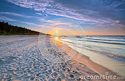 Sunset on the beach on the Baltic Sea Stock Photo