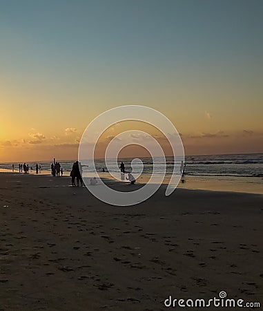 The sunset on the beach creates a beautiful silhouette on the Lombang beach in Sumenep Editorial Stock Photo