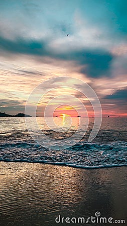 Sunset at beach horizon sea ocean dawn dusk Stock Photo
