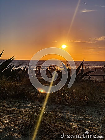 sunset on the beach, italy torvaianica . Seasundullrisesunset. Stock Photo