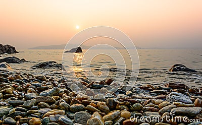 Sunset and beach and Ocean twilight at Koh Samet Stock Photo