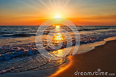 sunset beach sunrays Stock Photo