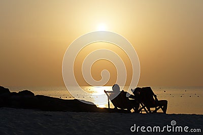 A sunset on the beach Stock Photo