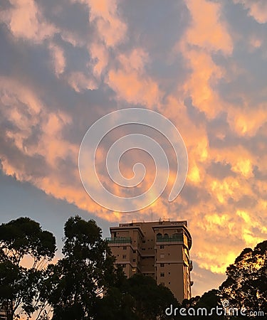 Sunset behind the building in the city Stock Photo