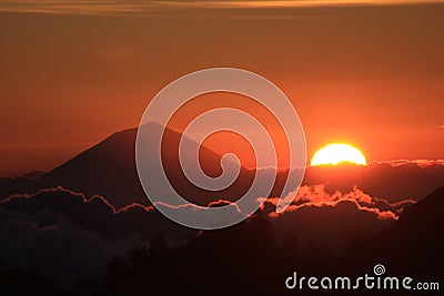 Sunset behind Gunung Agung, Bali. Stock Photo