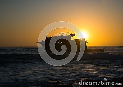 Sunset behind shipwreck near cape agulhas Stock Photo