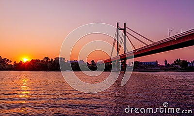 Sunset on Belgrade river named Sava with huge bridge across the river. Stock Photo