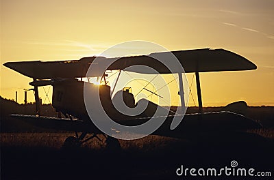 Sunset on biplane Tiger Moth Stock Photo