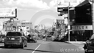 Sunset Boulevard Los Angeles - traffic, cars, hustler and commercials in black and white Editorial Stock Photo