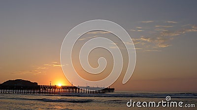 Sunset in Cerro Azul over a pier at south of Lima Stock Photo