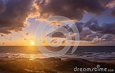 Sunset clouds on sea beach of romantic vacation Stock Photo