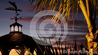 Sunset cloudscape, gazebo on beach, twilight dusk, dramatic sky. Alcove and vane Stock Photo