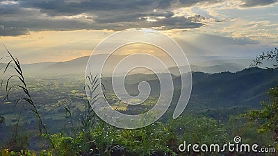 sunset and clound on forest mountains Stock Photo