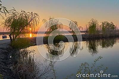 Sunset at Comana lake Stock Photo