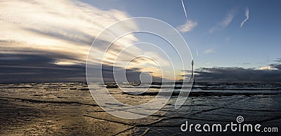 Sunset on Crosby Beach in winter - panorama, Crosby, Liverpool, UK Editorial Stock Photo