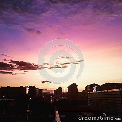 Sunset. Dark buildings in contrast with pink sky Editorial Stock Photo