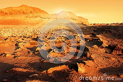 Sunset in the Dash-e Lut Desert. Drought. Climate change on Earth Stock Photo