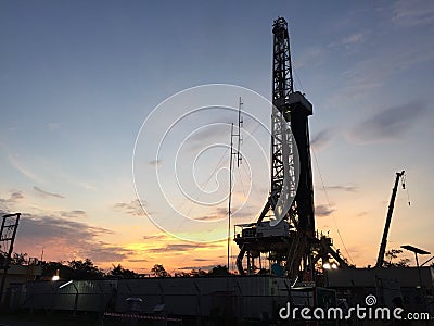 Sunset at drilling rig Editorial Stock Photo