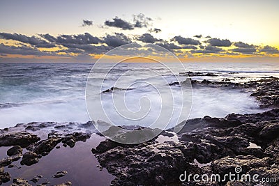 Sunset at El Bufadero natural blowhole on Gran Canaria. Ocean waves hiting rocks Stock Photo