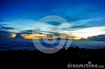 Sunset or an enchanting sunrise can be enjoyed on a mountain Stock Photo