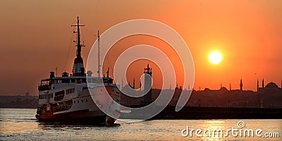 Sunset in Istanbul historical peninsula and ferryboat Stock Photo