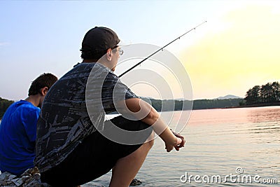 Sunset fishing Stock Photo