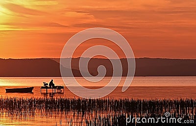 Sunset fishing Stock Photo