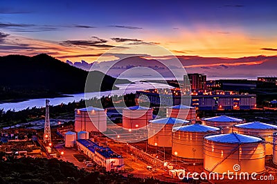 Sunset of fuel depot Stock Photo