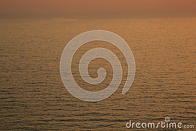 Sunset golden light reflection on sea wave ripple surface background. Abstract, tranquility, travel, serenity, romance, refresh, l Stock Photo