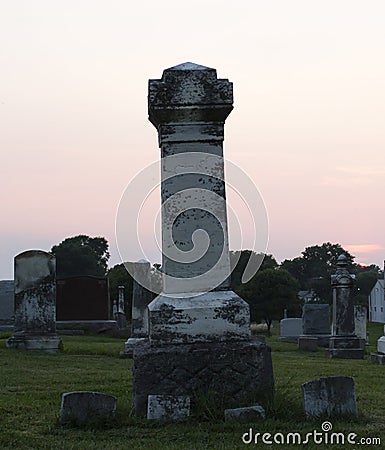 Sunset at Graveyard with Family Grave Lot Stock Photo