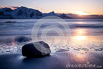 Sunset at Haukland Beach on the Lofoten Islands in Norway Stock Photo