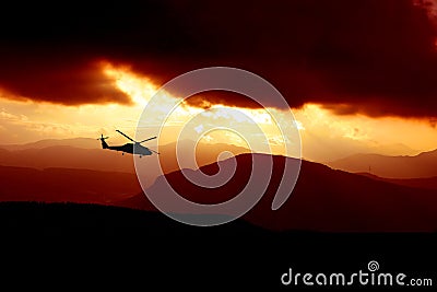 Sunset helicopter Stock Photo