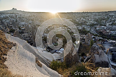 Sunset at the horizon in GÃ¶reme, Cappadoci. Tourist town with fairy chimneys houses in Cappadocia Stock Photo