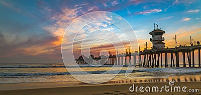 Sunset by the Huntington Beach Pier in California Stock Photo