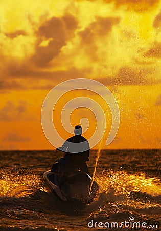 Sunset jetski Stock Photo