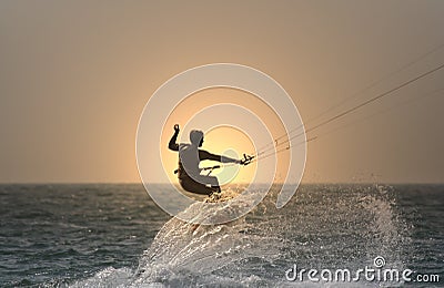 Sunset kitesurfer Stock Photo