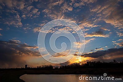 sunset at the lake with a beautiful sky and coal mining mines, czech karvina OKD Stock Photo