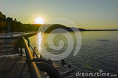 Sunset landscape of Danube River at town of Golubac, Serbia Editorial Stock Photo