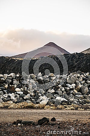 Landscape of mountains and volcanic rock soil Stock Photo