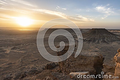 Sunset landscape over the salt lake of Bahariya oasis as seen from the top of Jebel Dist Stock Photo