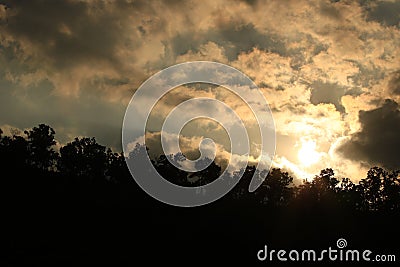 Sunset landscape view of silhouette mountains with sky and clouds and sun,twilight sky and clouds with evening sunset background, Stock Photo