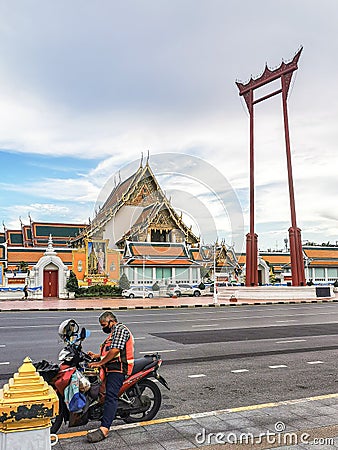 Sunset landscape of Wat Suthat Thep Wararam Editorial Stock Photo