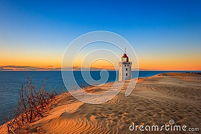 Sunset at the lighthouse of Rubjerg Knude Stock Photo