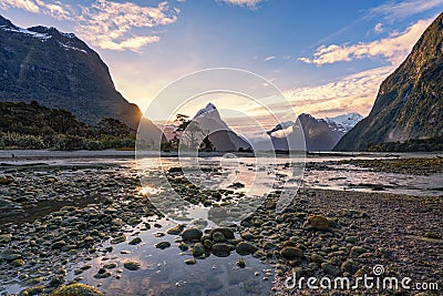 Sunset during low tide at Milford Sound, Southland, New Zealand`s South Island. Stock Photo