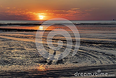 Sunset at low tide - Chatelaillon Plage - France Stock Photo