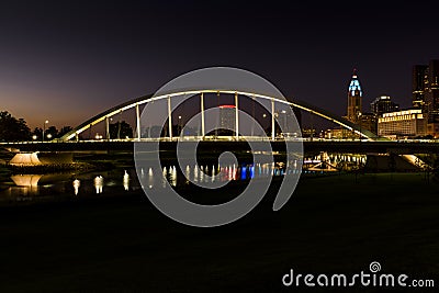 Sunset at Main Street Tied Arch Suspension Bridge over Scioto River in Columbus, Ohio Stock Photo