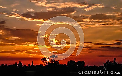 Sunset makes Red clouds Stock Photo