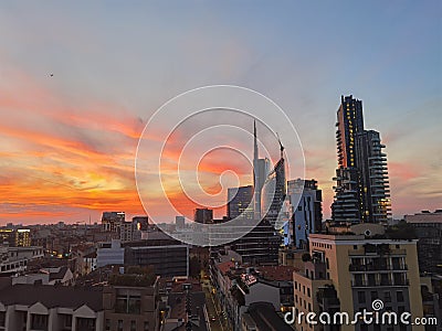 Sunset in Milan City Center from rooftop bar - Italy Stock Photo