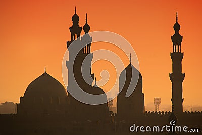 Sunset on minarets of Cairo Stock Photo